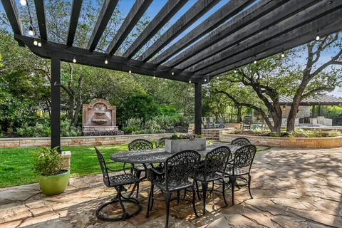 a view of a swimming pool with a patio