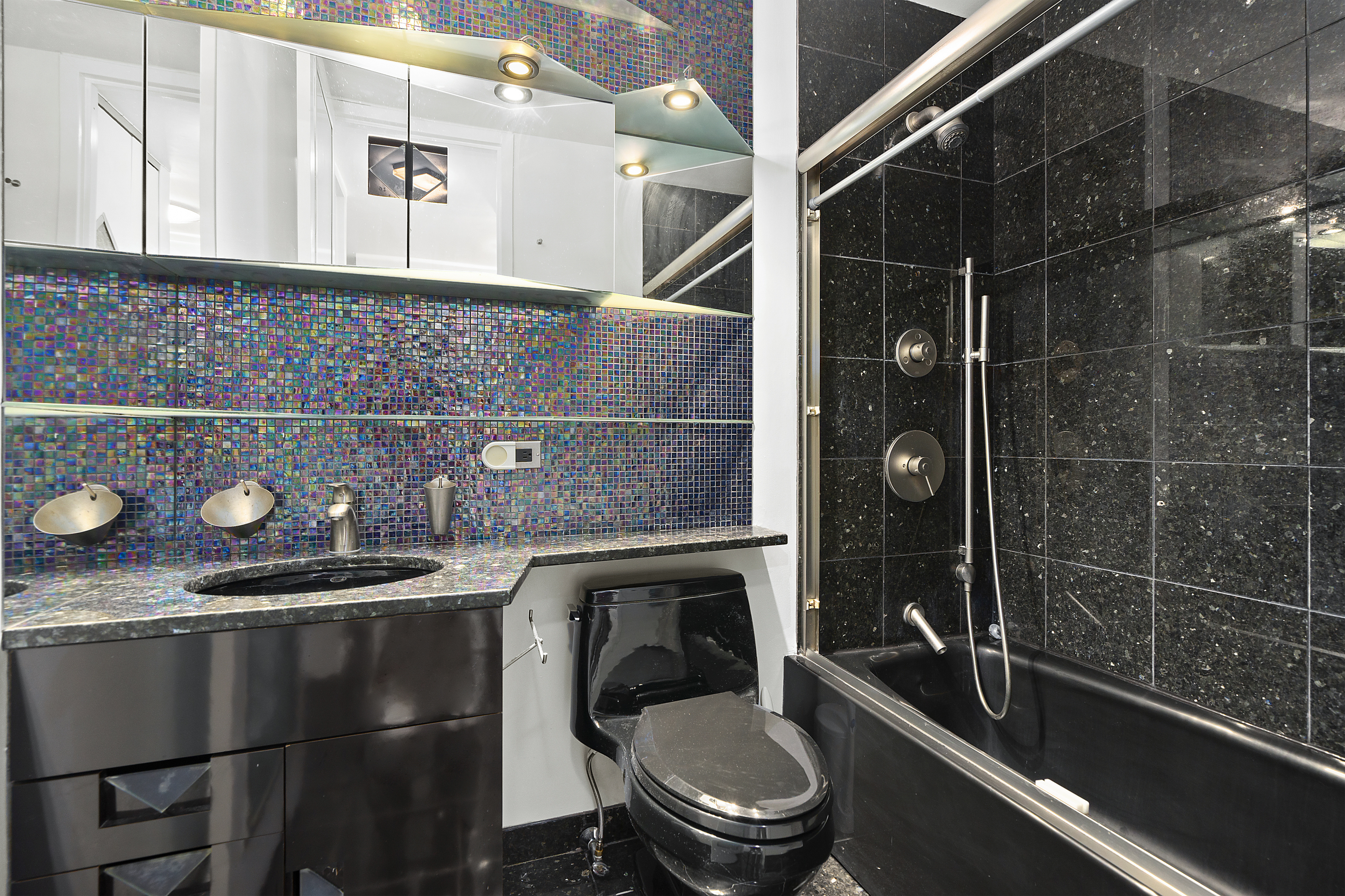 1 Irving Place, Unit U19C Manhattan, NY 10003 - Photo 5 of 7 a bathroom with a toilet and a sink