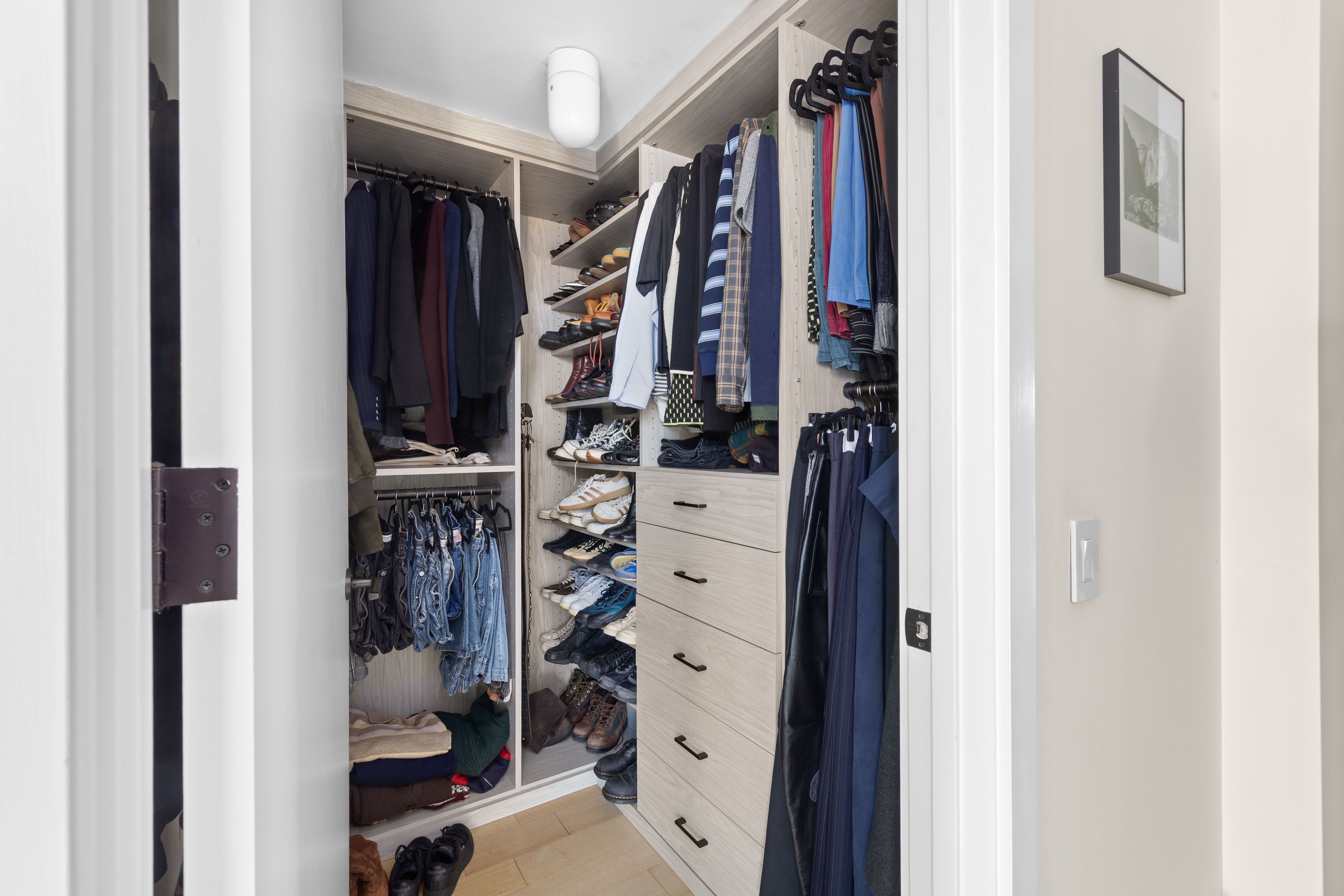 33 Conselyea Street, Unit PH Brooklyn, NY 11211 - Photo 9 of 16 a view of walk in closet with clothes and shoes