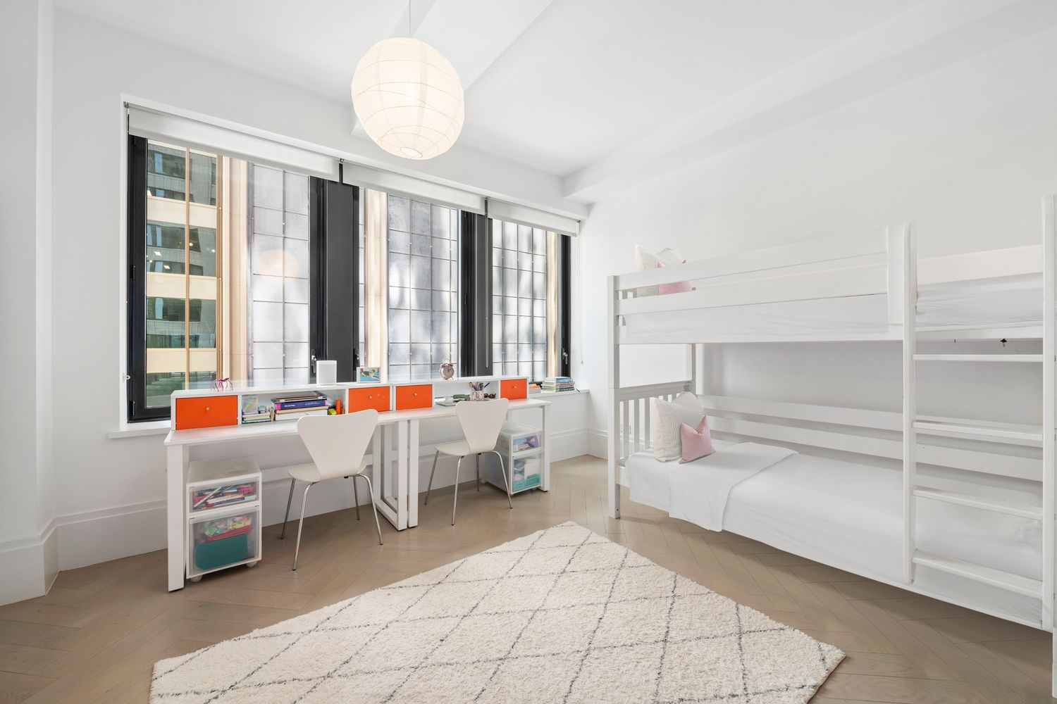 101 Wall Street, Unit 5BE Manhattan, NY 10005 - Photo 7 of 16 a living room with furniture and large windows