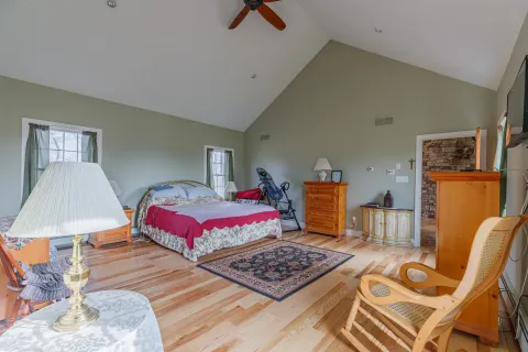 an aerial view of residential houses with outdoor space and street view