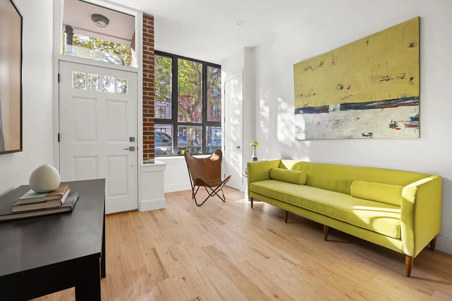 a living room with furniture and window