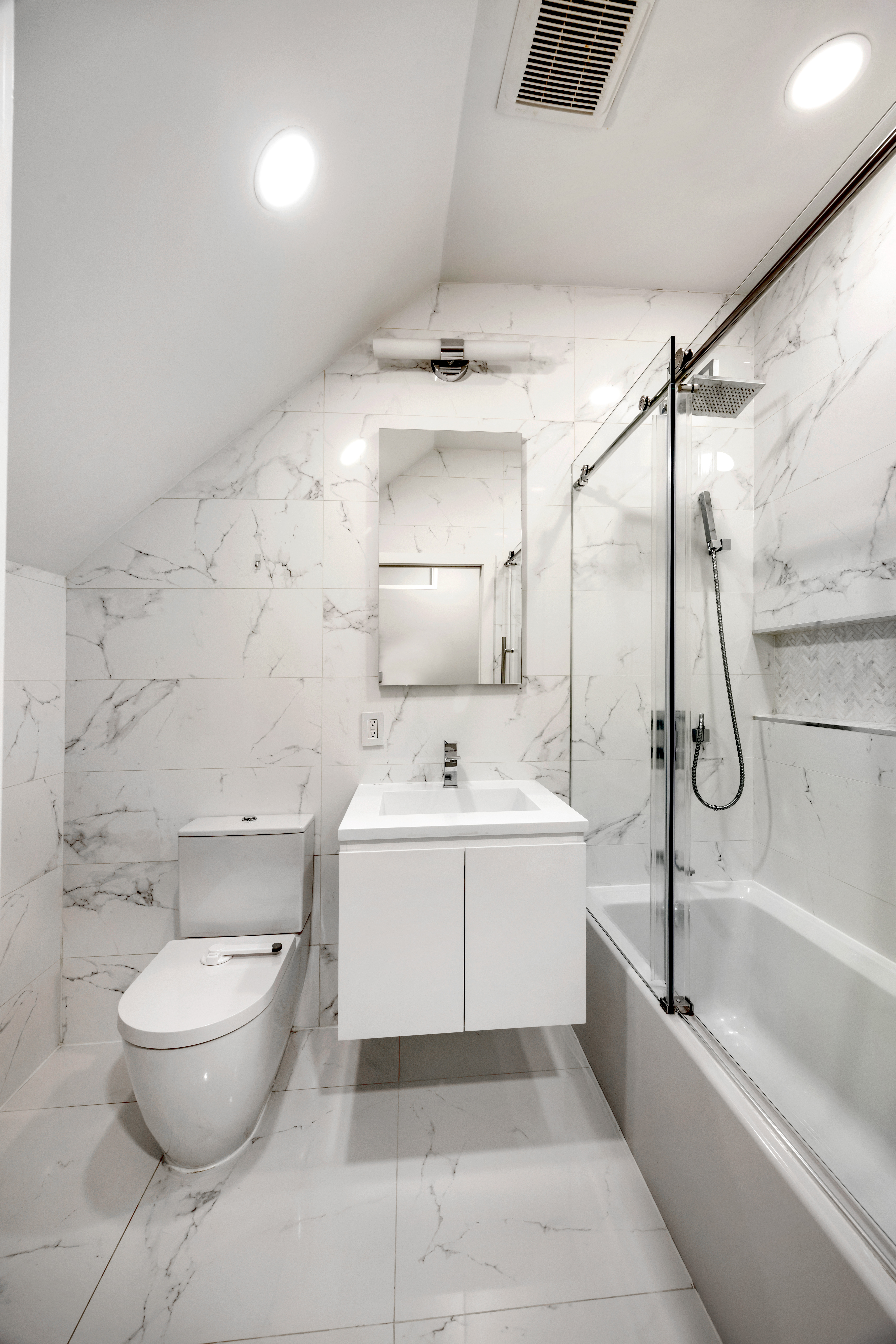 43 Murray Street Manhattan, NY 10007 - Photo 7 of 13 a bathroom with a sink toilet and shower