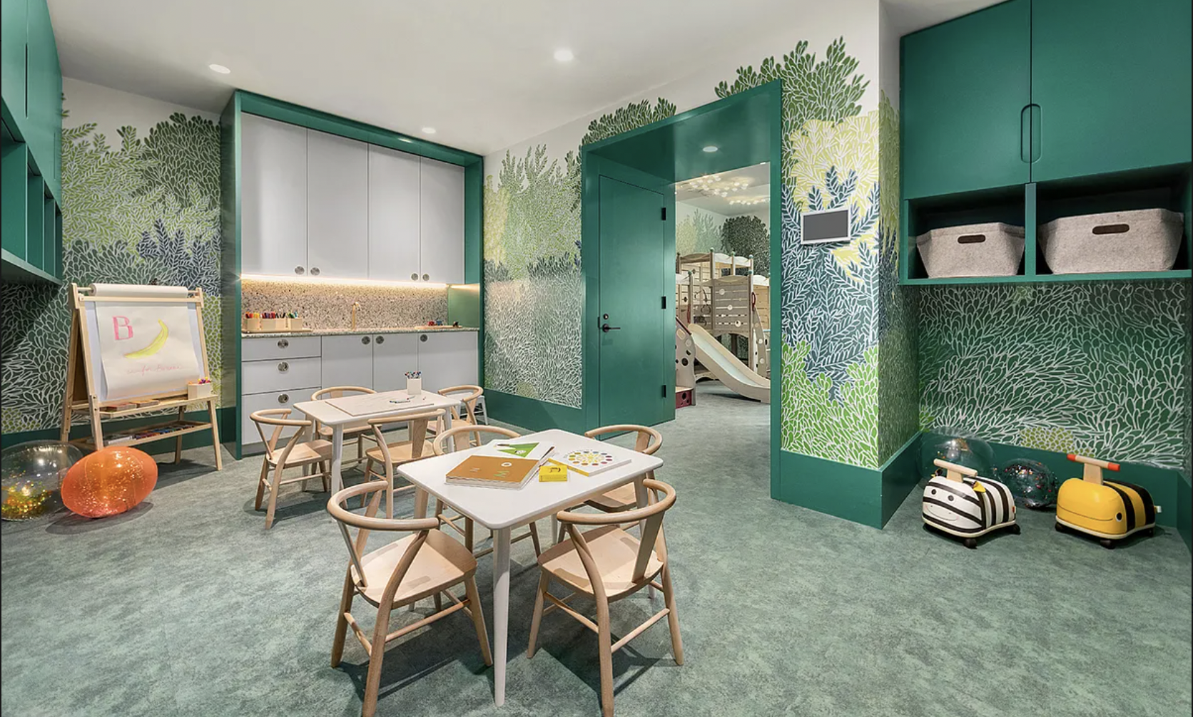 20 River Terrace, Unit 6Q Manhattan, NY 10282 - Photo 18 of 20 a backyard of a house with table and chairs