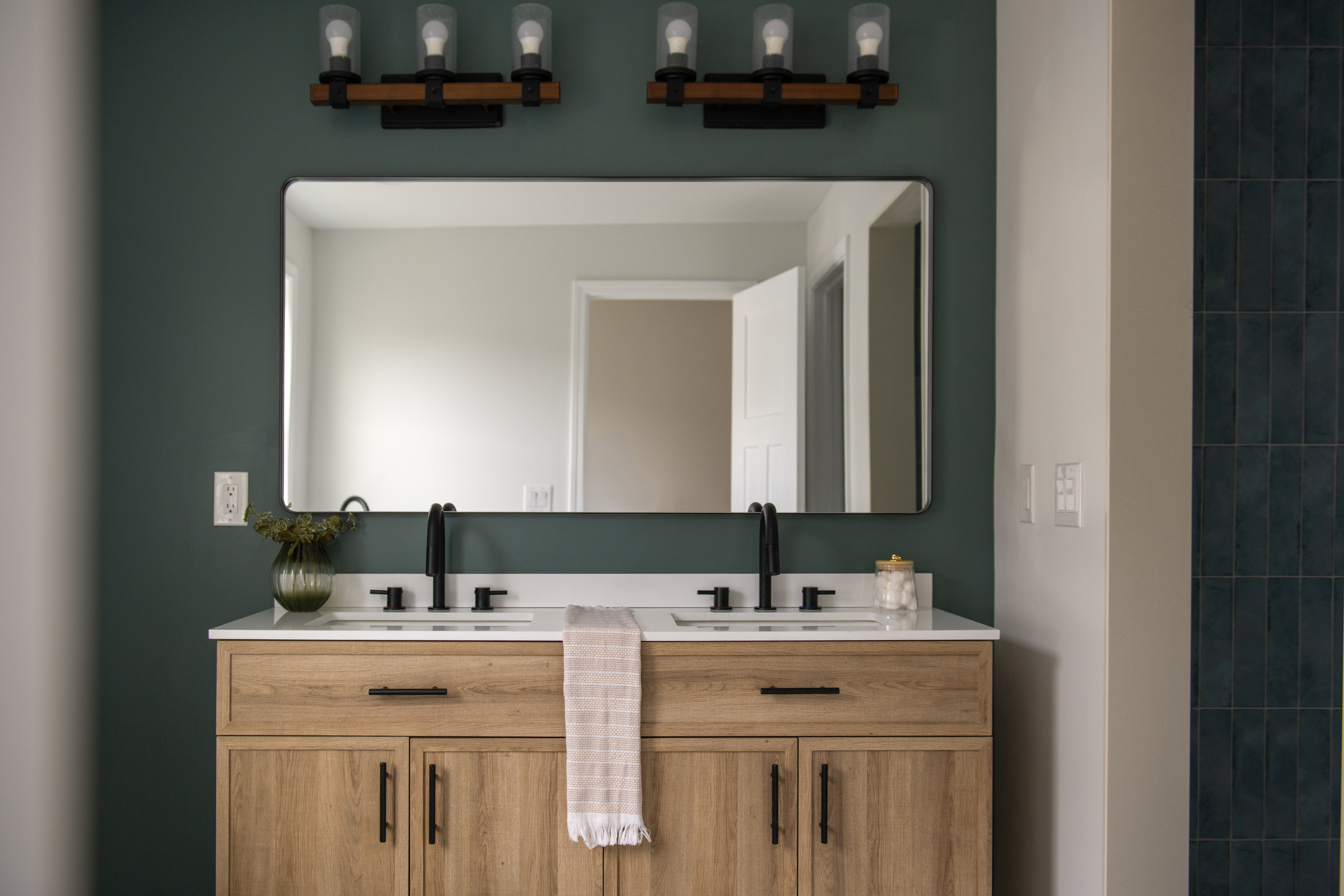 5412 Carnegie Street Pittsburgh, PA 15201 - Photo 44 of 55 a bathroom with a double vanity sink and mirror