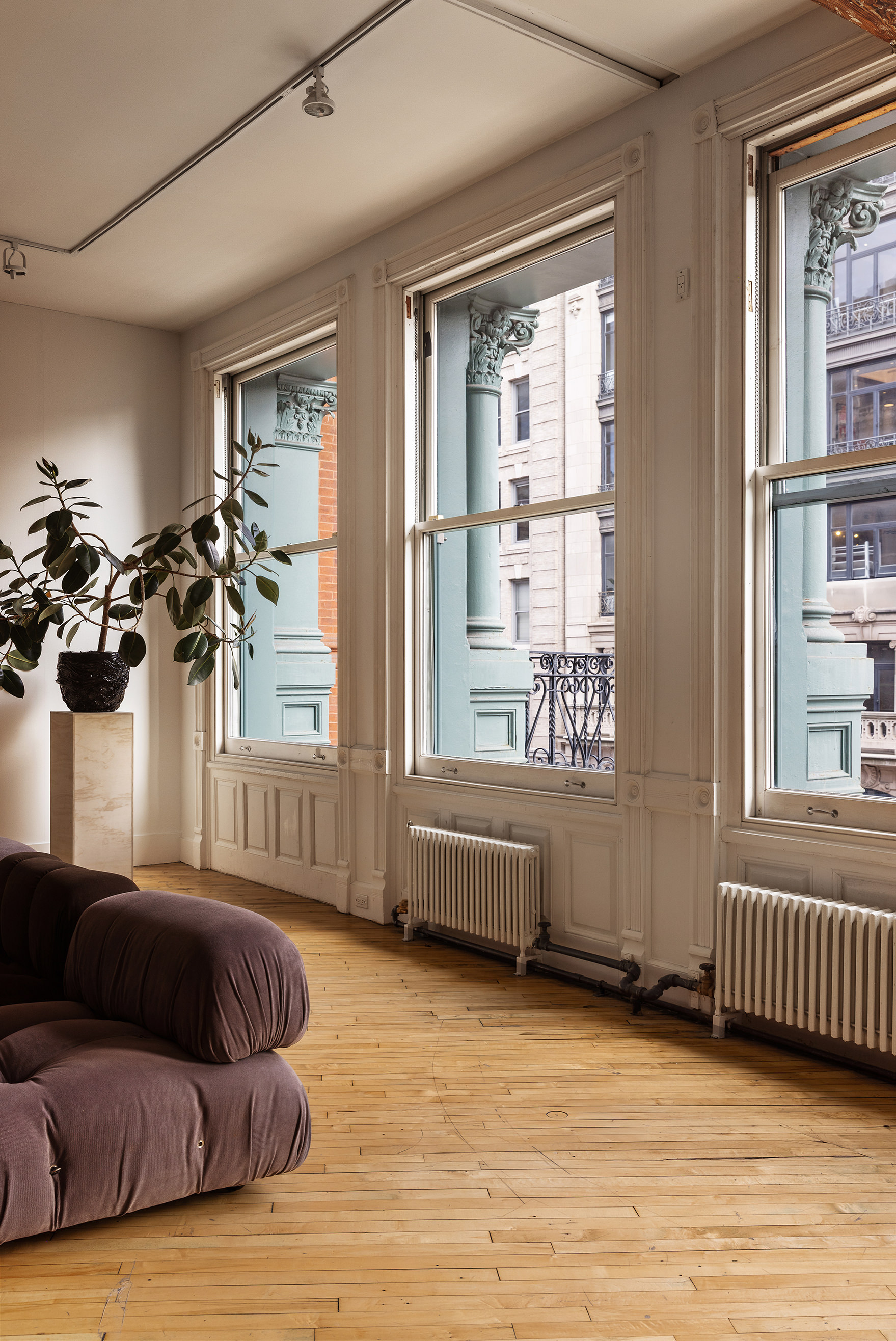 515 Broadway, Unit 4B Manhattan, NY 10012 - Photo 3 of 13 a living room with furniture and a large window