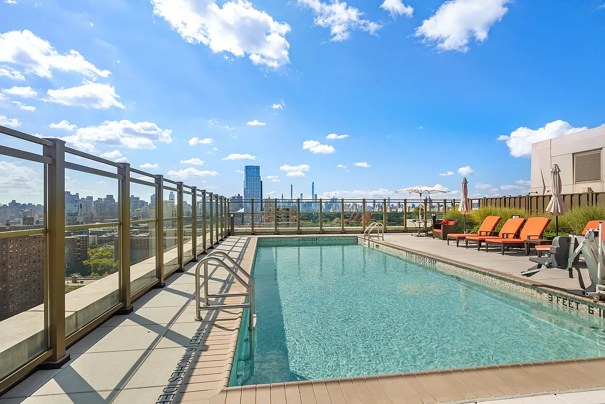 1280 5th Avenue, Unit 19E Manhattan, NY 10029 - Photo 7 of 12 a view of a swimming pool and a back yard