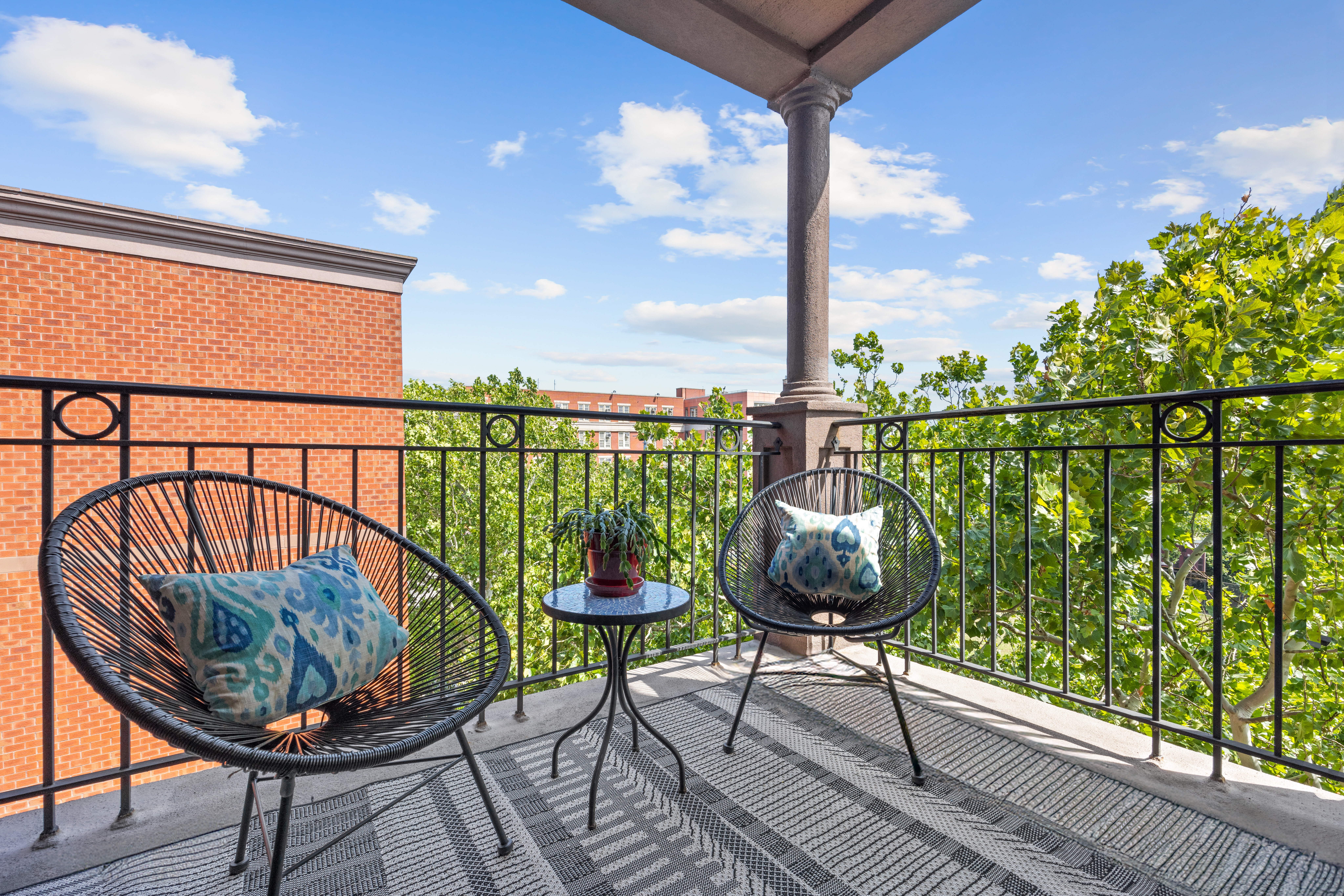 93 Rapelye Street, Unit 6C Brooklyn, NY 11231 - Photo 3 of 14 a view of a balcony with chairs and wooden floor