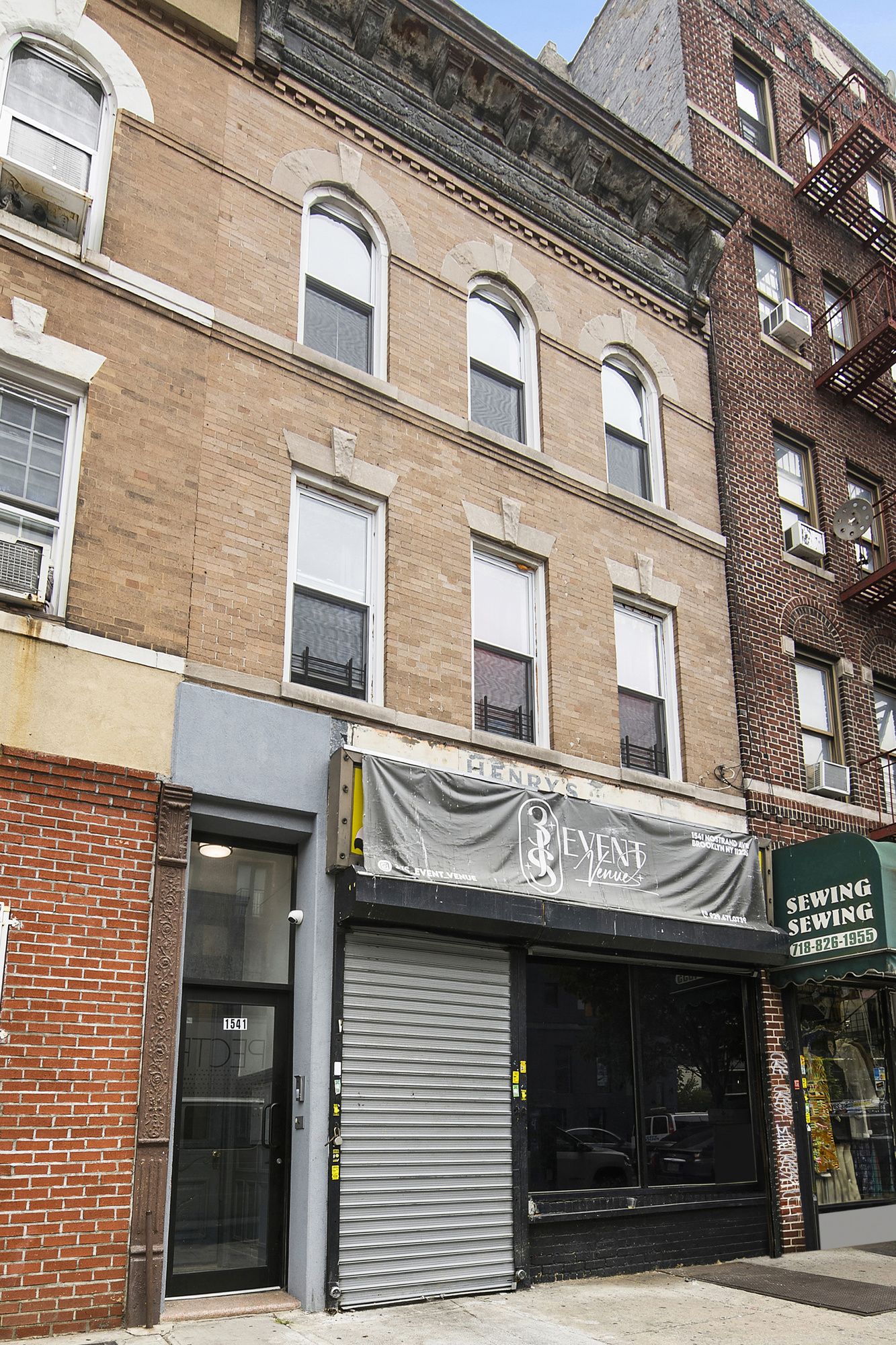 1541 Nostrand Avenue Brooklyn, NY 11226 - Photo 14 of 16 a view of a building with retail shop and windows