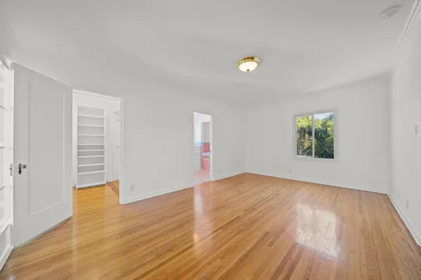 a bathroom with a bathtub sink and window