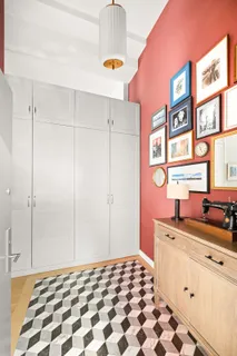 a kitchen with a sink cabinets and appliances