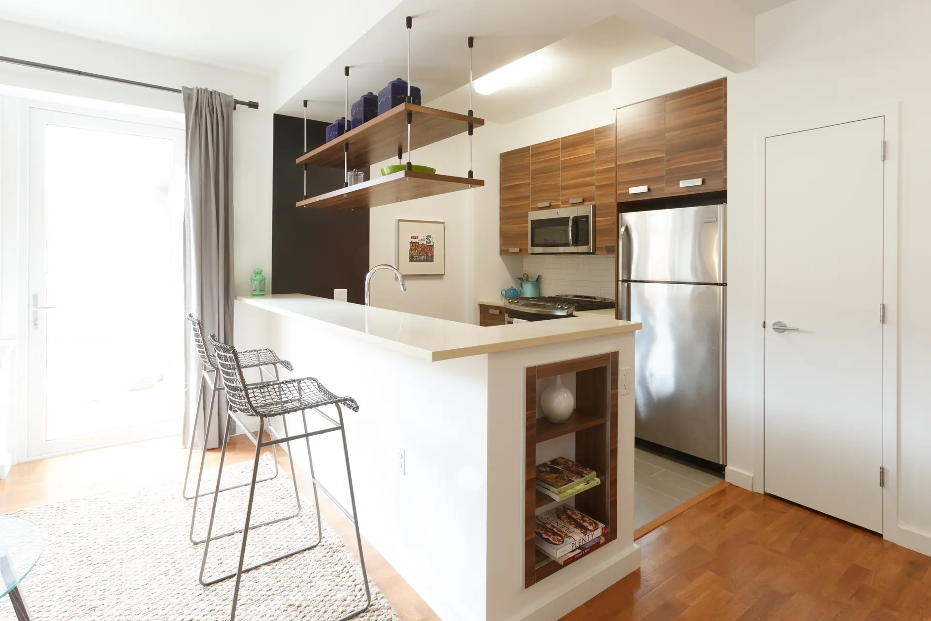 22 Caton Place, Unit 4H Brooklyn, NY 11218 - Photo 1 of 20 a kitchen with stainless steel appliances a refrigerator and a stove