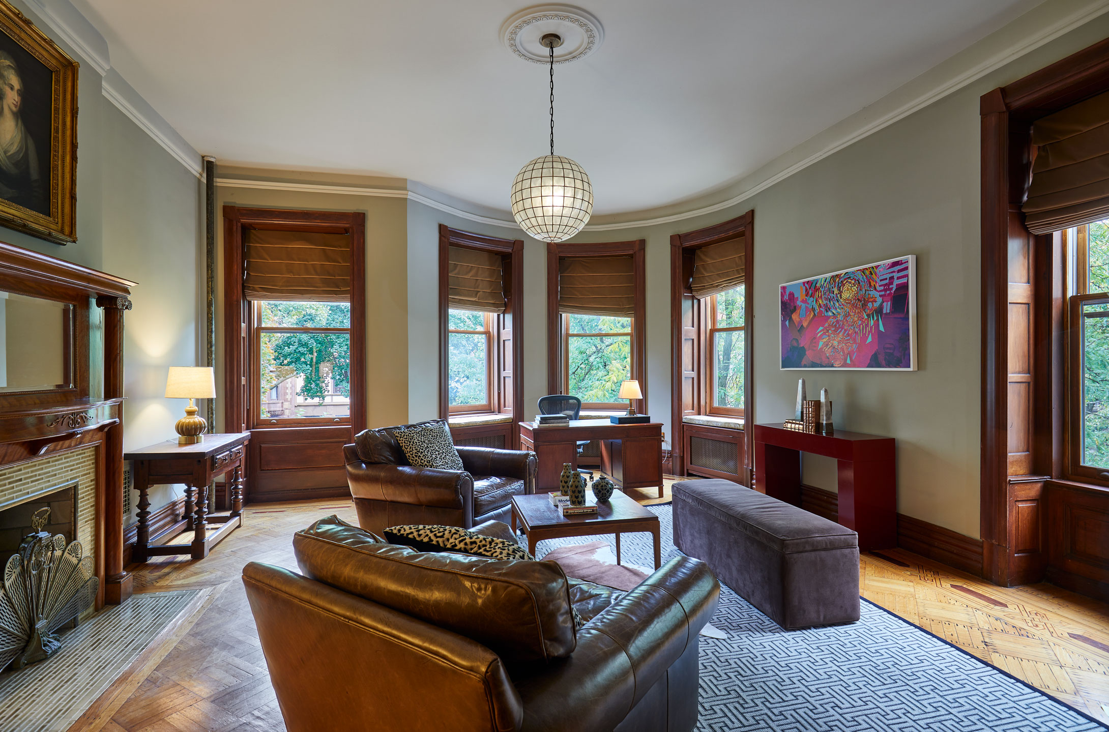 320 Convent Avenue Manhattan, NY 10031 - Photo 9 of 15 a living room with furniture chandelier and a large window