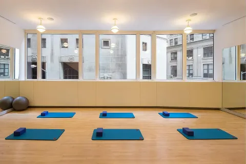 a kitchen with a refrigerator and a more cabinets
