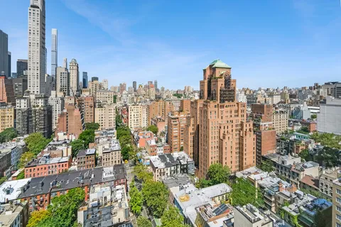 a view of a city with tall buildings