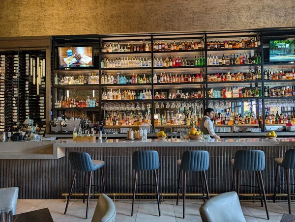 a view of a chairs and table in a patio