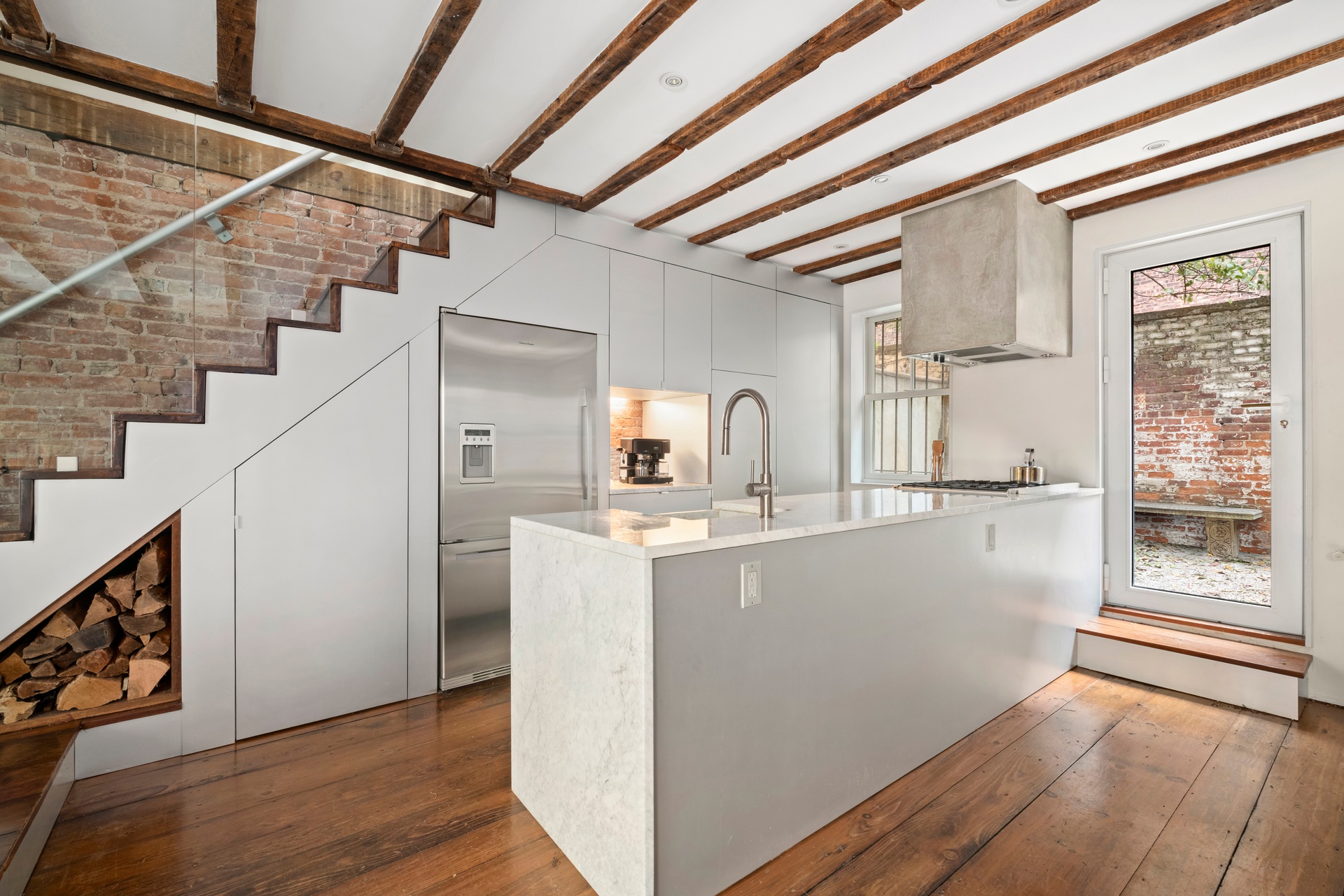 8 Sylvan Terrace Manhattan, NY 10032 - Photo 4 of 19 a view of a hallway with wooden floor and staircase