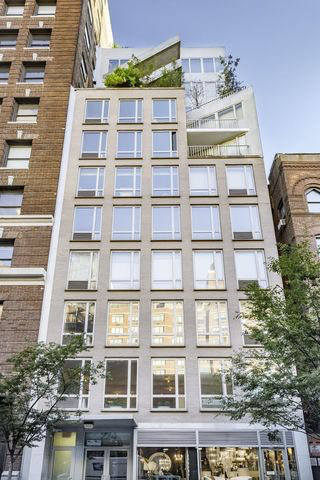 224 West 18th Street, Unit 6C Manhattan, NY 10011 - Photo 19 of 21 front view of a building
