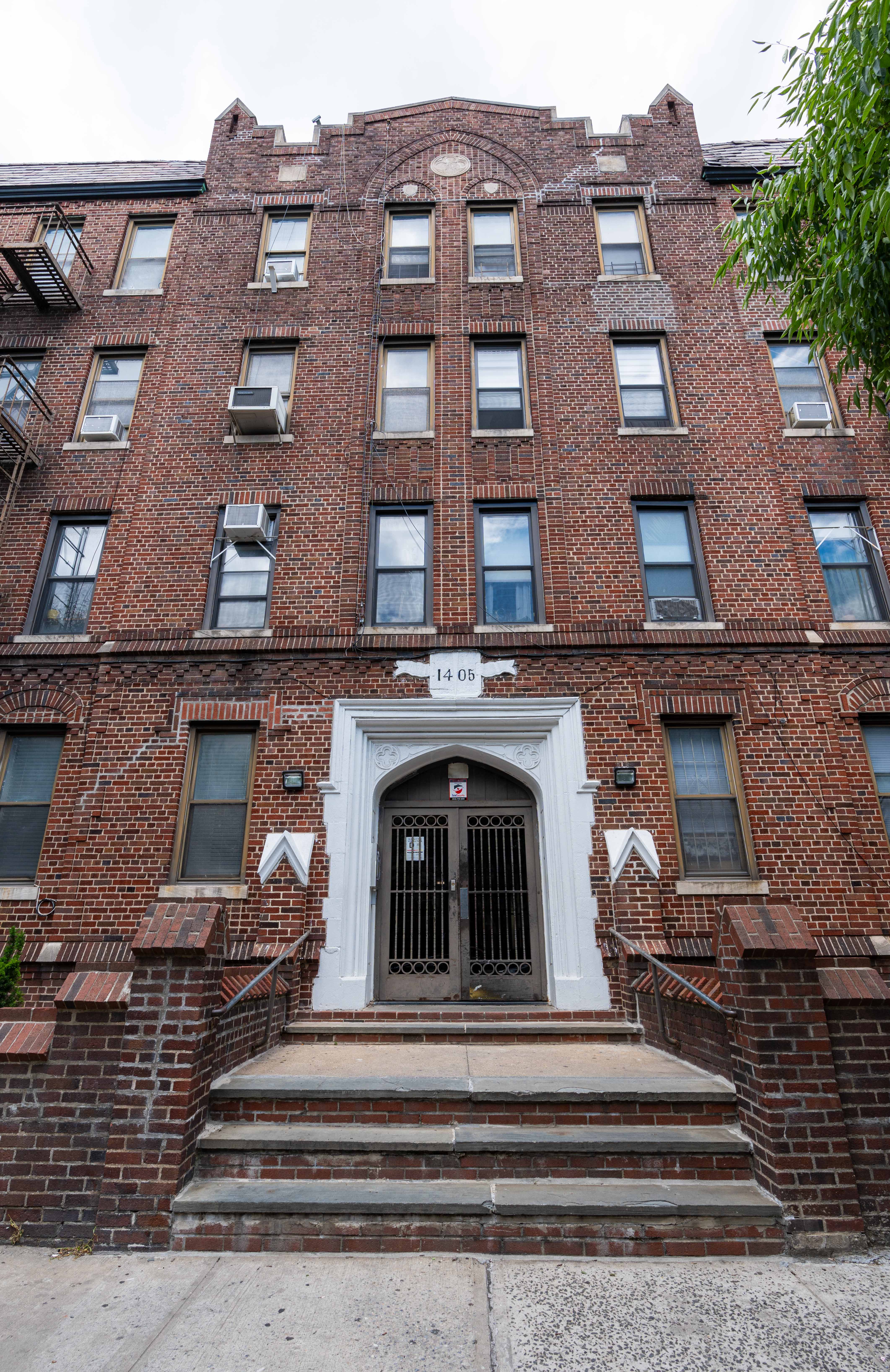1405 Prospect Place, Unit B11 Brooklyn, NY 11213 - Photo 10 of 12 a view of a building with a clock tower in front of it