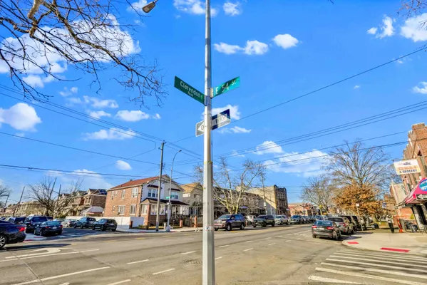 a view of a street with cars