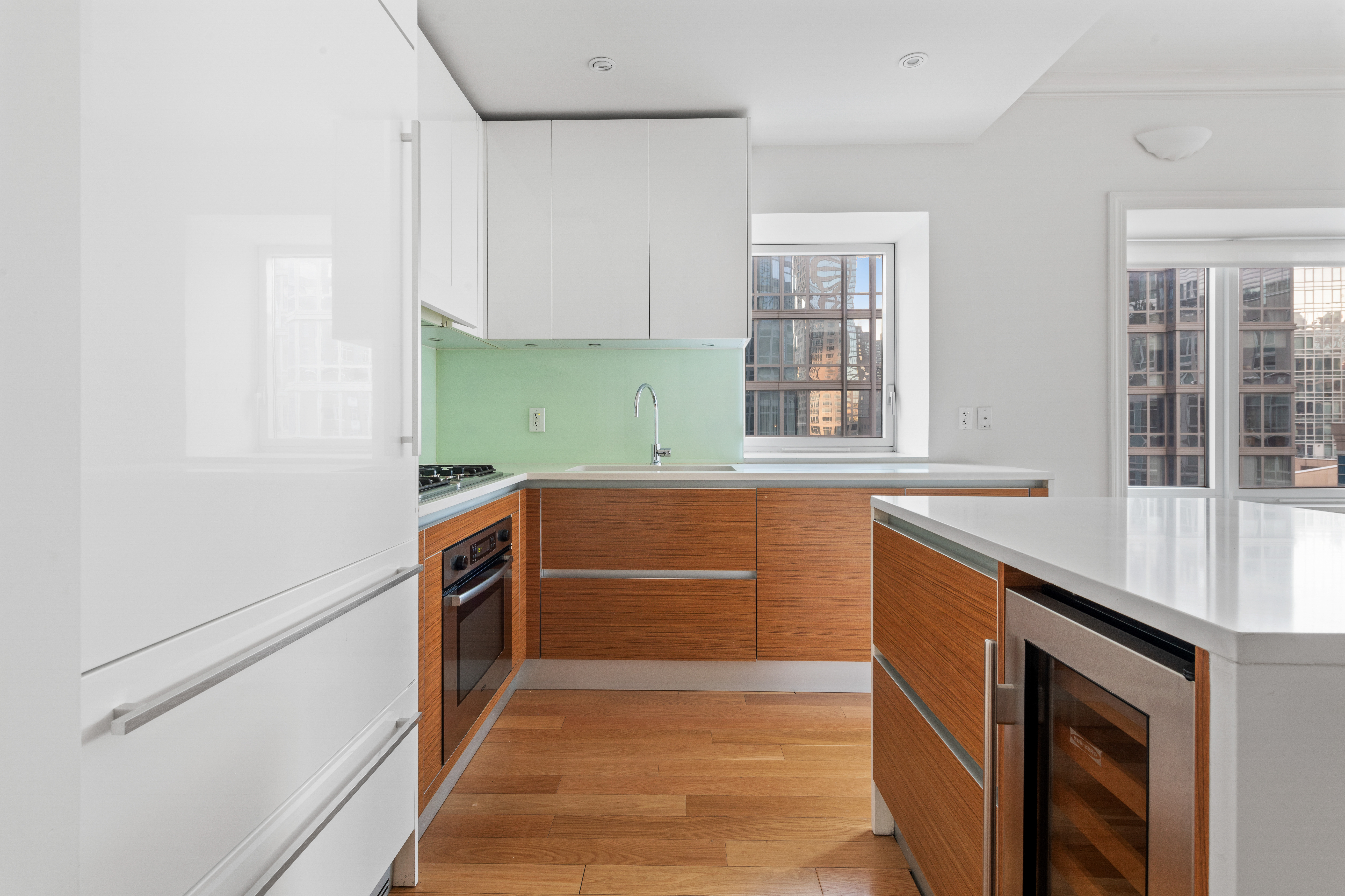 555 West 59th Street, Unit 8B Manhattan, NY 10019 - Photo 3 of 14 a view of cabinets and window
