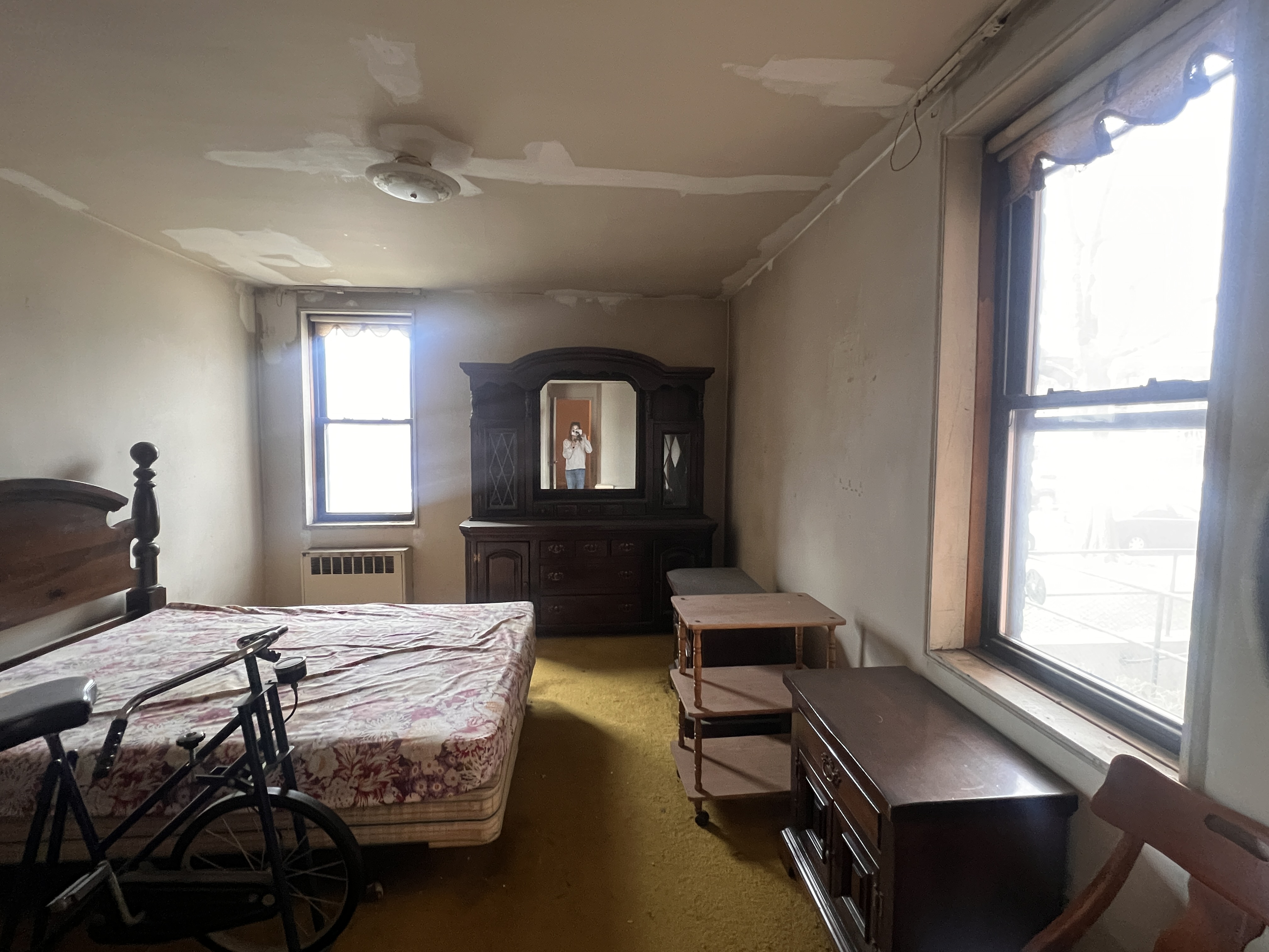 2251 Knapp Street, Unit 1C Brooklyn, NY 11229 - Photo 8 of 12 a living room with furniture and a window