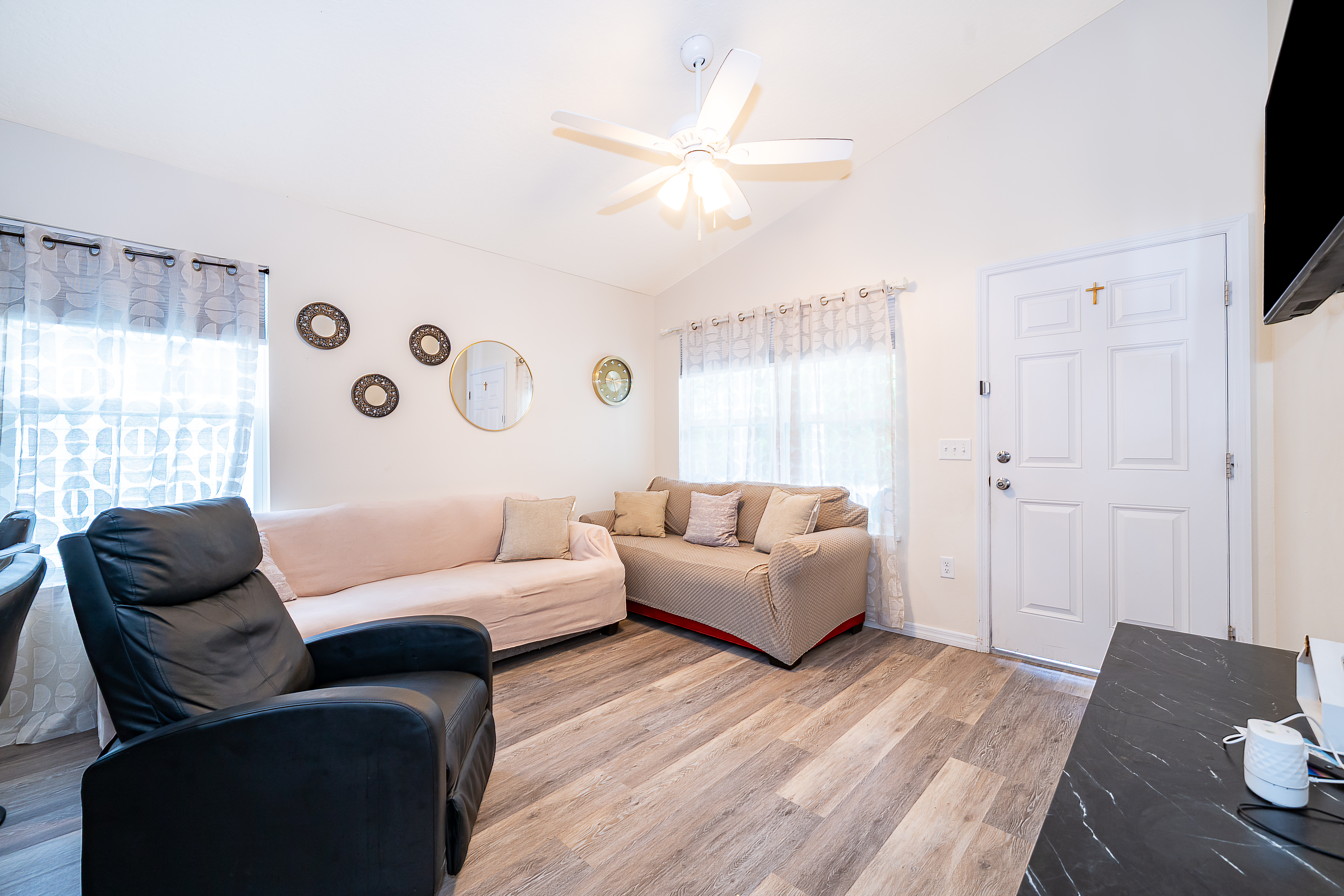 1360 Cottage Circle Tavares, FL 32778 - Photo 5 of 25 a living room with furniture and a flat screen tv