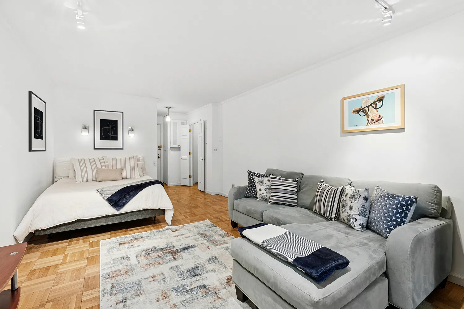 a bedroom with furniture and a couch