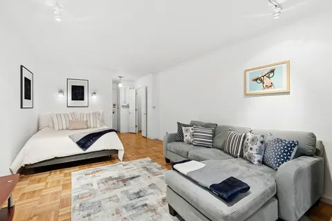 a bedroom with furniture and a couch