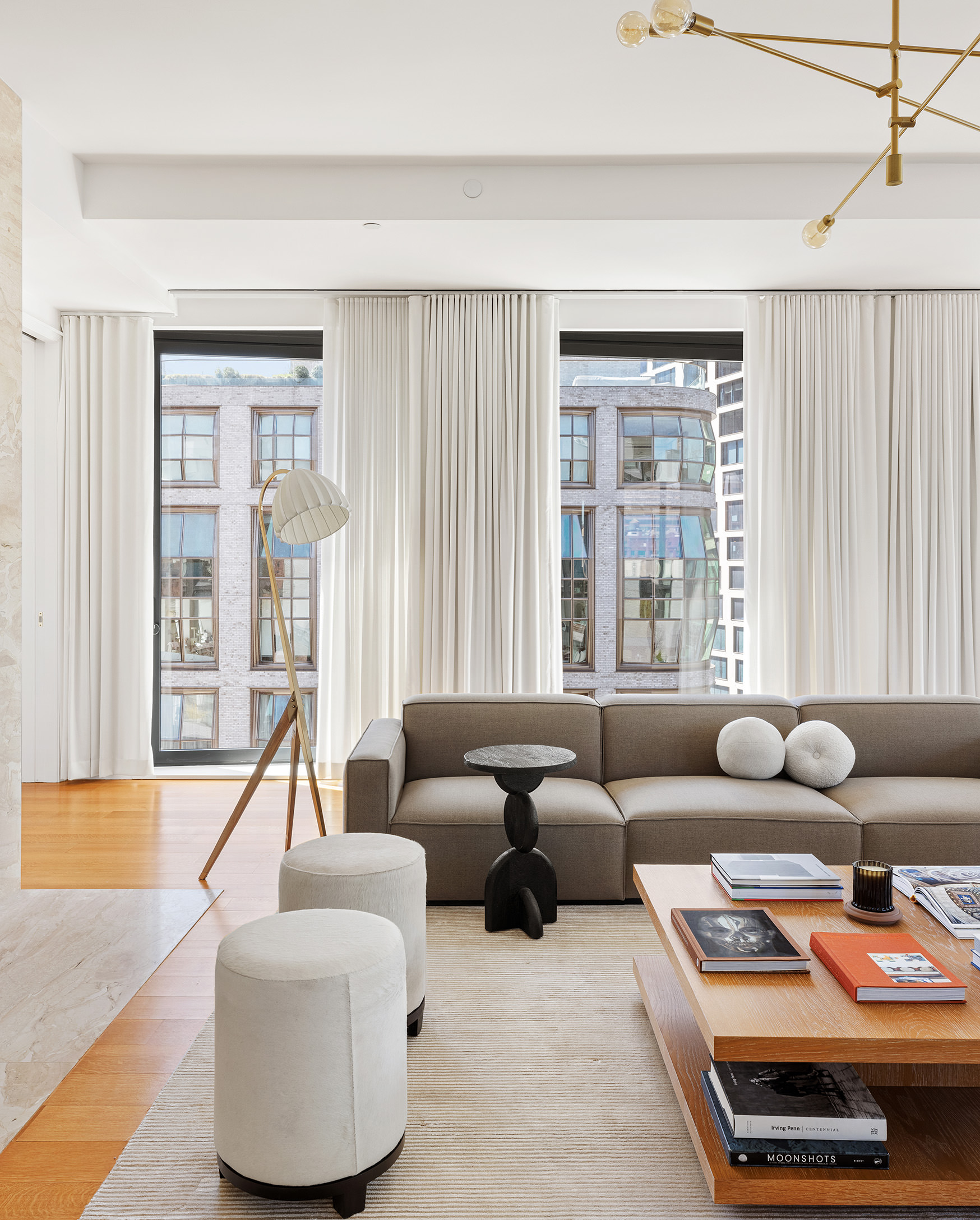 505 West 19th Street, Unit PH1 Manhattan, NY 10011 - Photo 4 of 26 a living room with furniture and a large window
