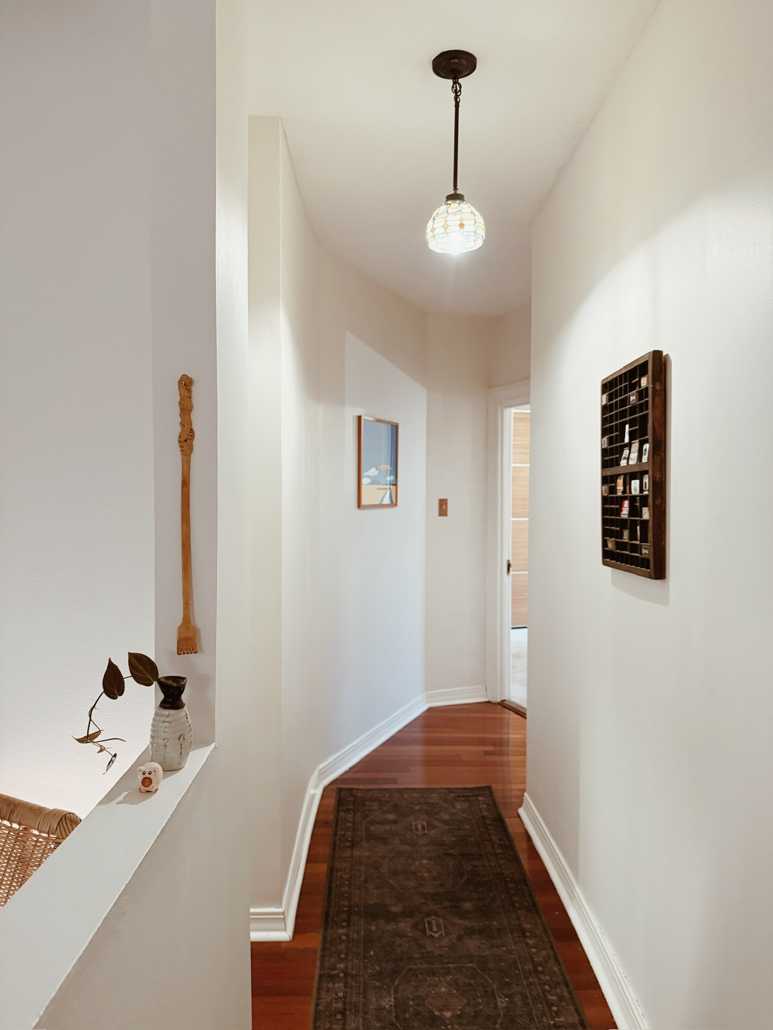 7901 4th Avenue Brooklyn, NY 11209 - Photo 6 of 10 a bedroom with a bed and a chandelier