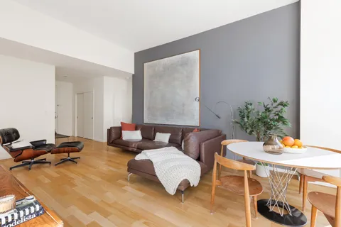 a living room with furniture and a couch