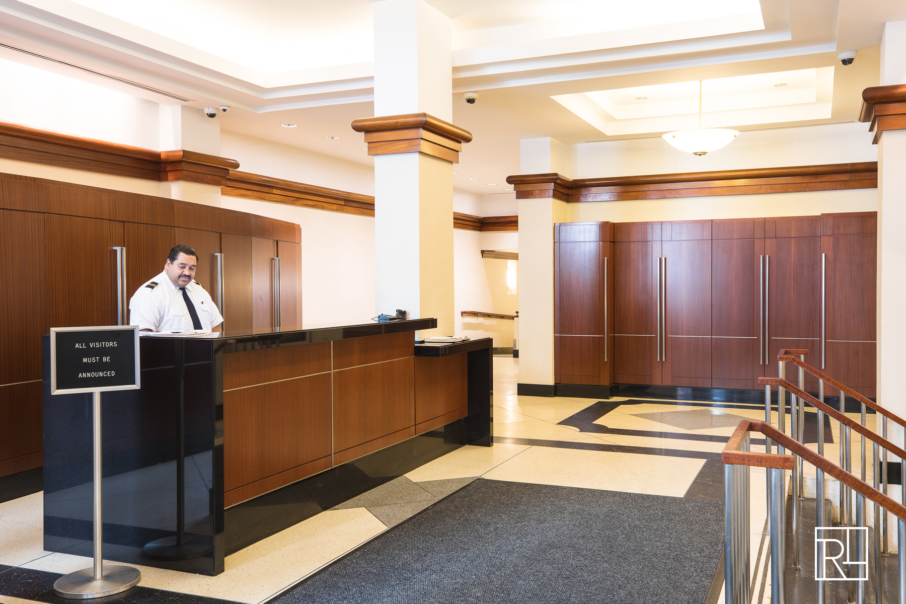 10 West 15th Street, Unit 403 Manhattan, NY 10011 - Photo 11 of 12 a bathroom with a sink and a mirror
