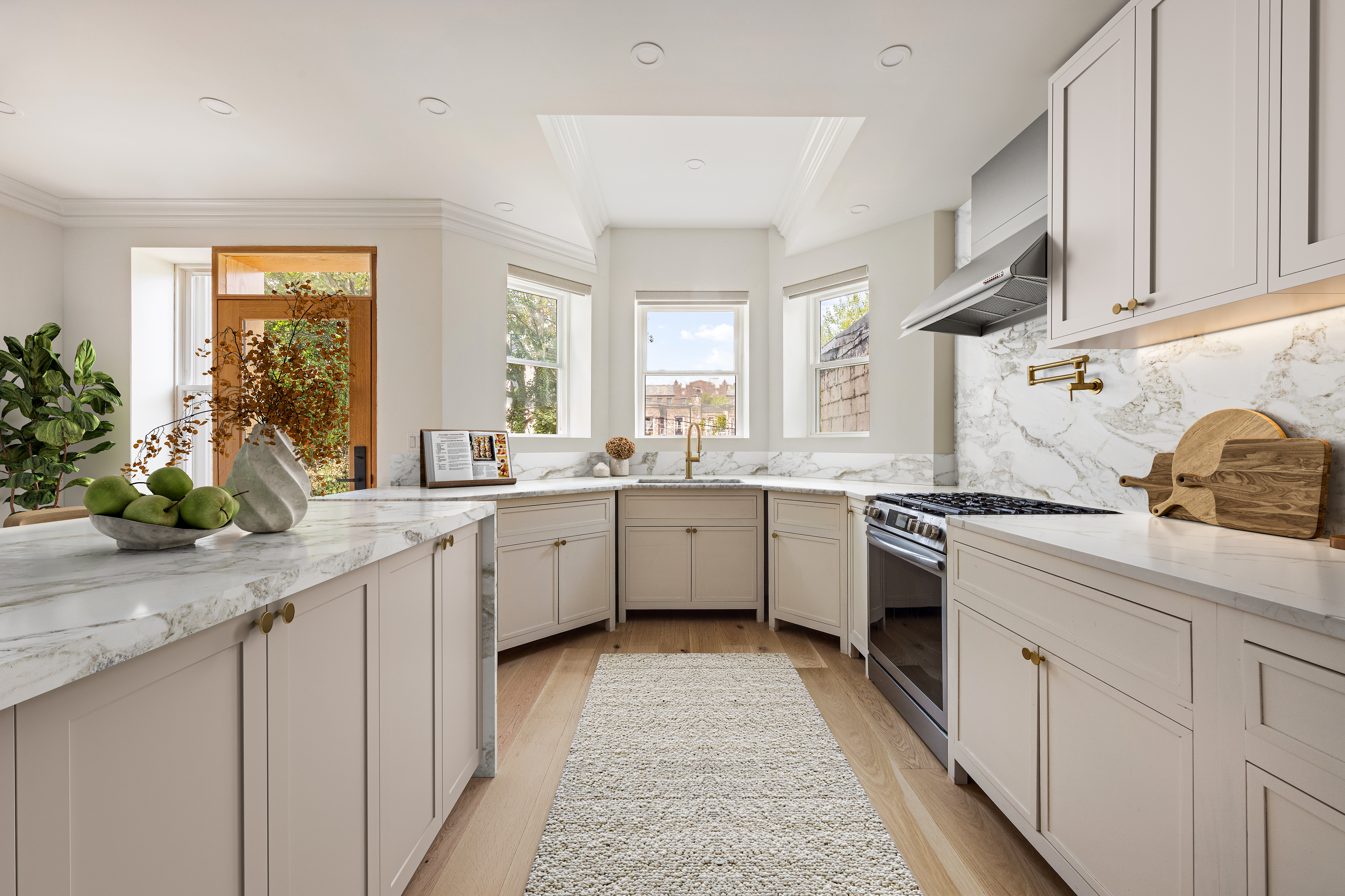 1423 Park Place Brooklyn, NY 11213 - Photo 9 of 17 a kitchen with a sink stove and cabinets