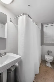 a bathroom with a sink and mirror