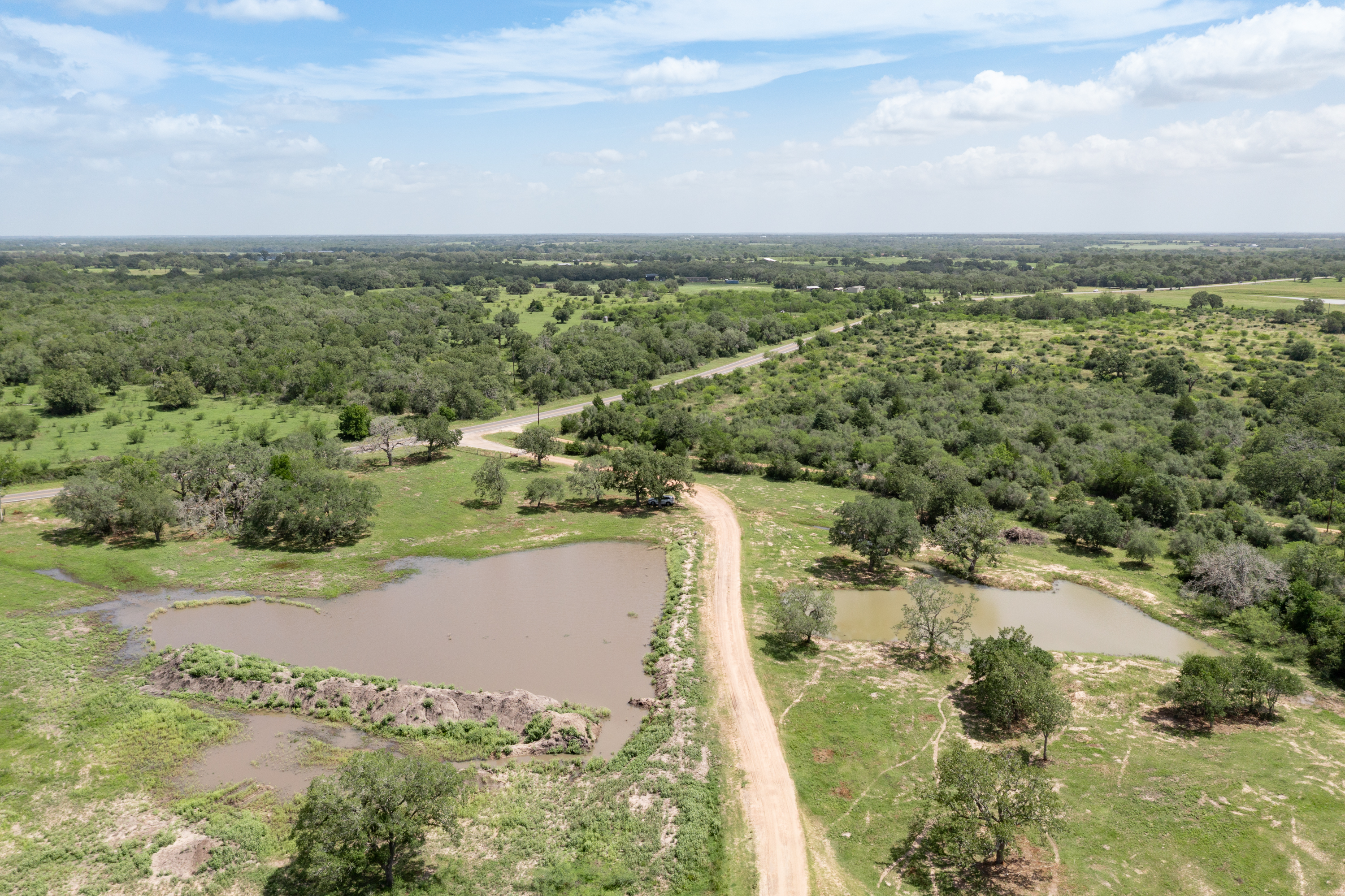 54.68 Cattle Guard Road Cuero, TX 77954 - Photo 64 of 67 a view of a lake with a city