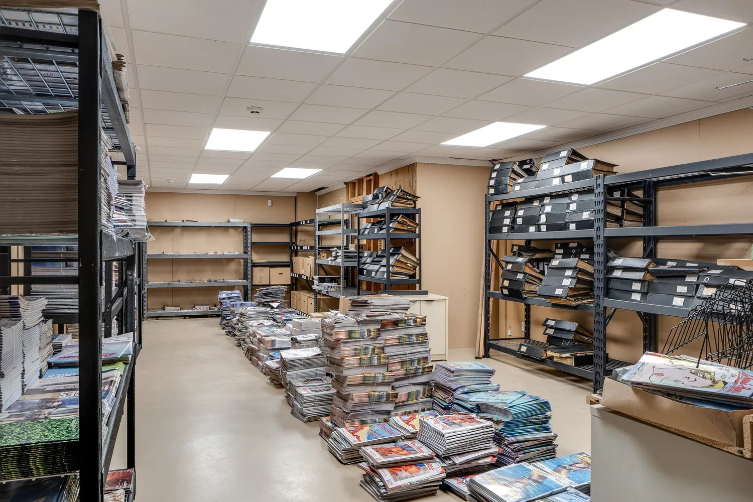 a view of a street with a garage