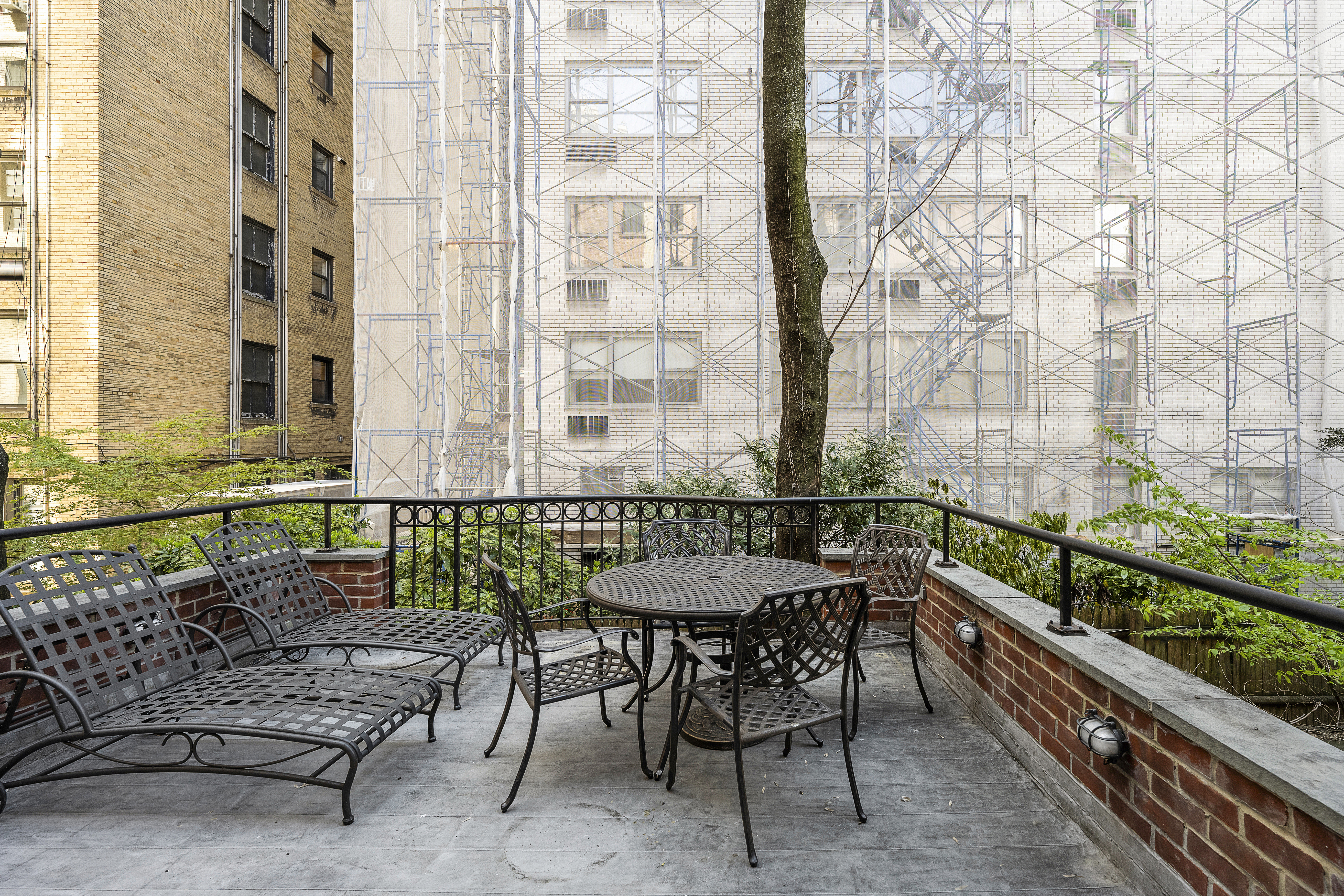 50 East 73rd Street Manhattan, NY 10021 - Photo 19 of 32 a view of a chairs and table in the balcony