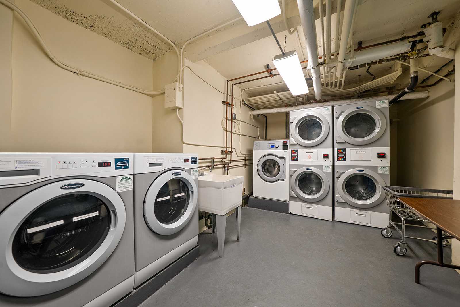 35-30 73rd Street, Unit 1F Queens, NY 11372 - Photo 9 of 10 a utility room with dryer and washer