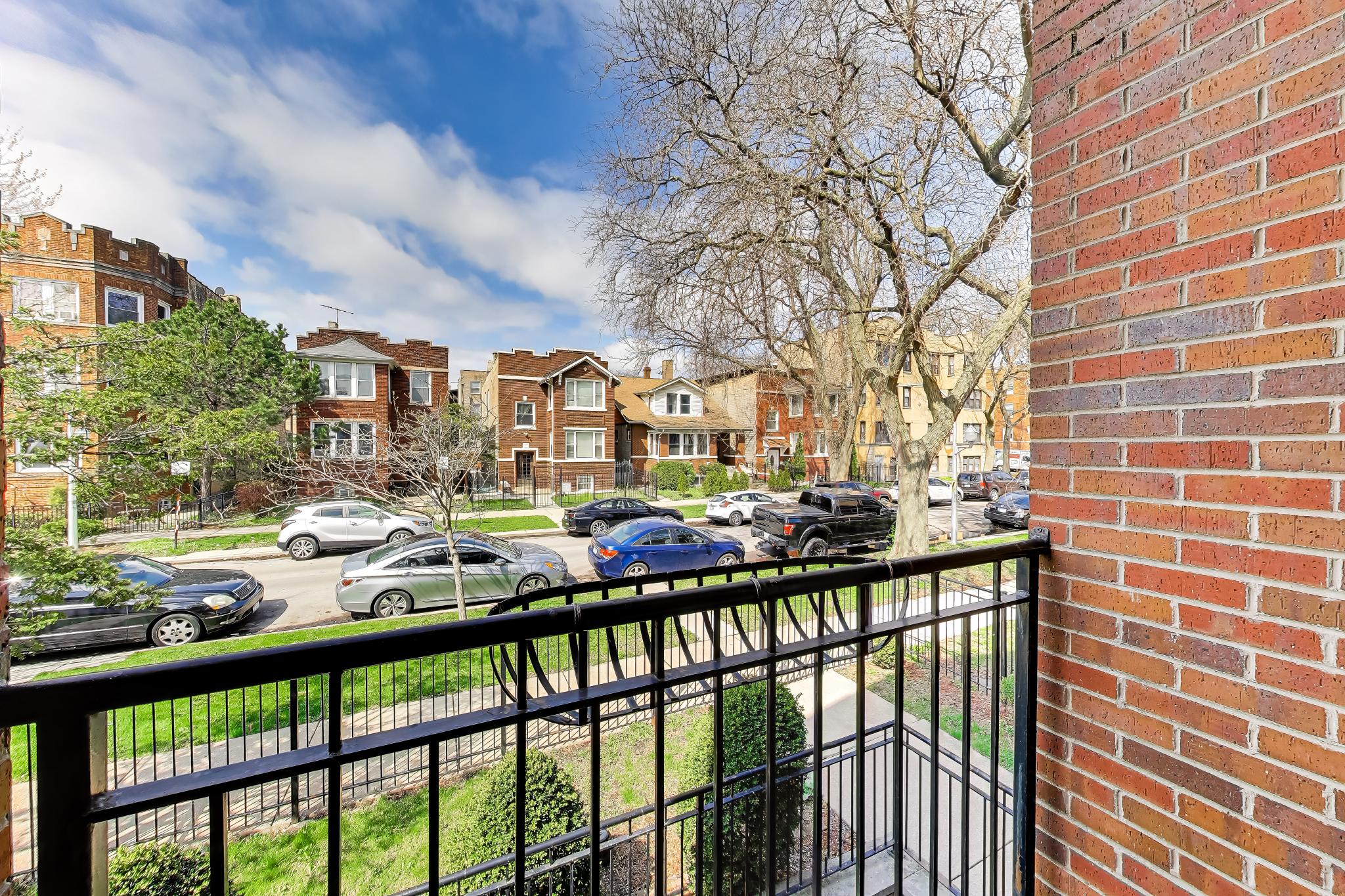 4845 North Springfield Avenue, Unit 2 Chicago, IL 60625 - Photo 8 of 32 a view of city from a balcony