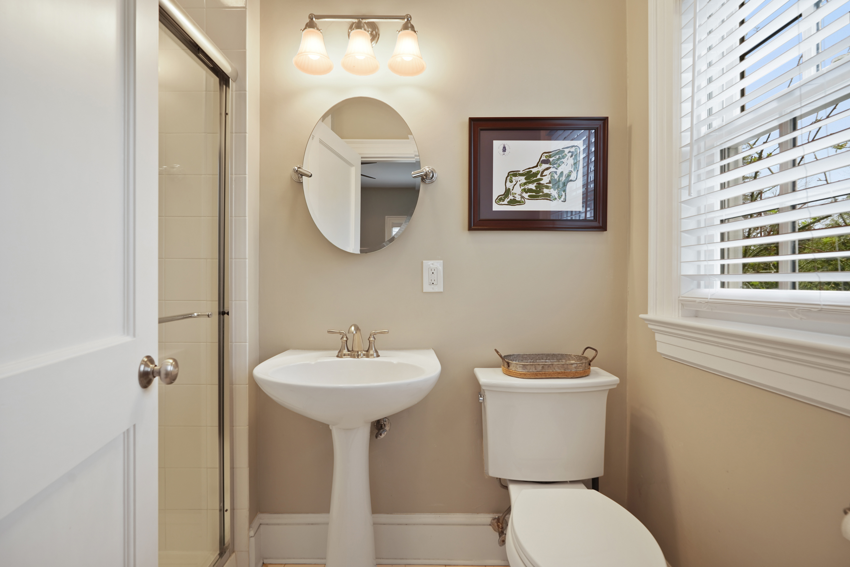 15 Anderson Road Greenwich, CT 06830 - Photo 12 of 30 a bathroom with a toilet sink and mirror