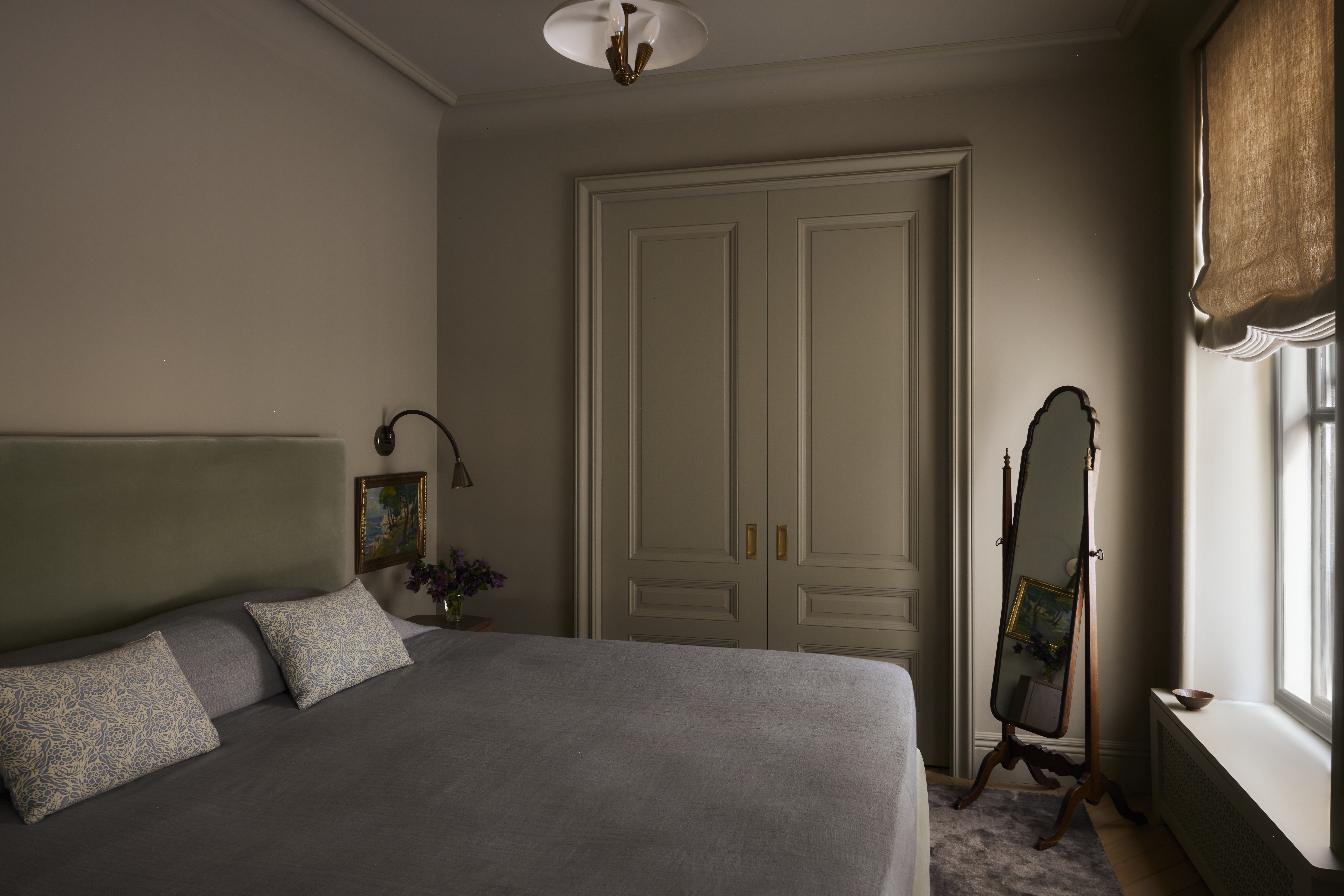 2109 Broadway, Unit 15/157 Manhattan, NY 10023 - Photo 8 of 19 a bedroom with a bed and a flat tv screen on a dresser