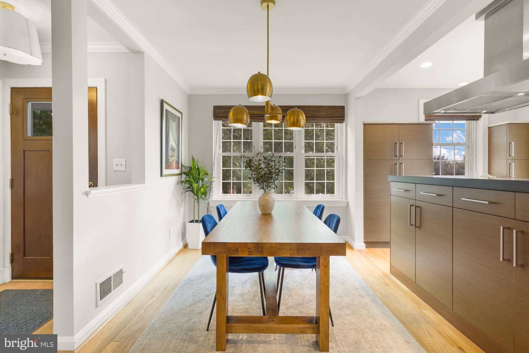 2611 Ross Road Chevy Chase, MD 20815 - Photo 8 of 37 a view of a dining room with furniture window and outside view