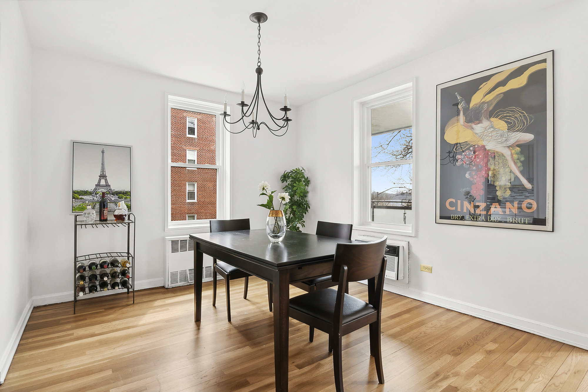 9201 Shore Road, Unit B301 Brooklyn, NY 11209 - Photo 5 of 12 a view of a dining room with furniture and wooden floor
