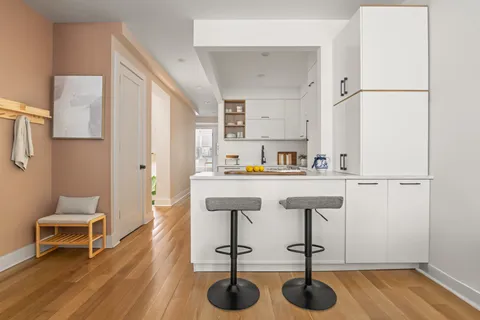 a view of kitchen with dining area and appliances