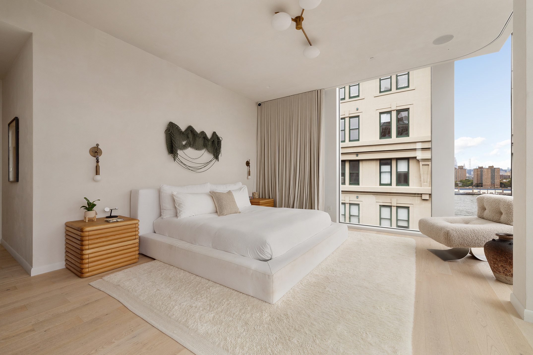 168 Plymouth Street, Unit PHA Brooklyn, NY 11201 - Photo 11 of 21 a bedroom with a bed furniture and a large window