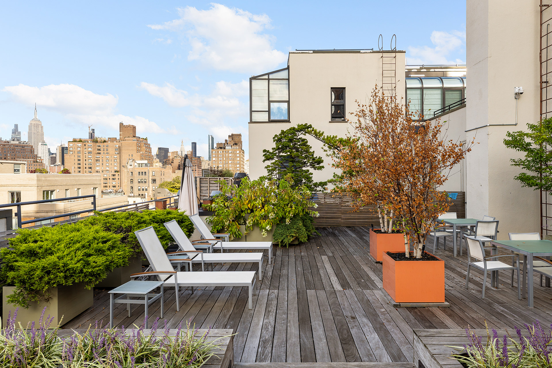 380 West 12th Street, Unit 6CD Manhattan, NY 10014 - Photo 18 of 19 an outdoor sitting area with furniture and wooden floor