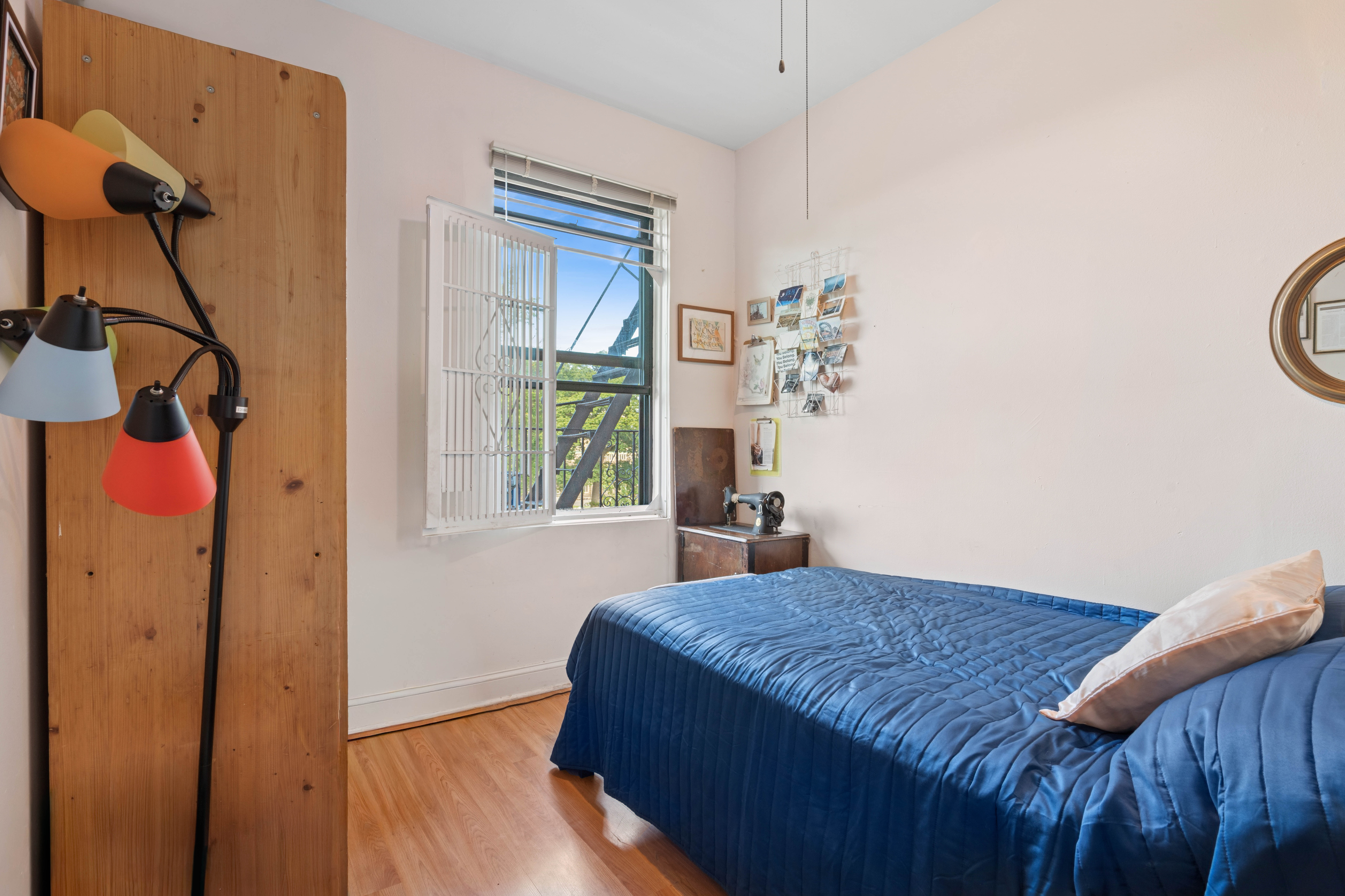550 West 153rd Street, Unit 34 Manhattan, NY 10031 - Photo 6 of 8 a bedroom with a bed and a window