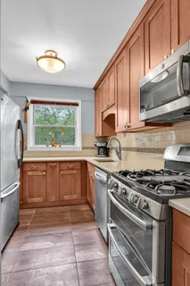 a kitchen with a stove and a microwave