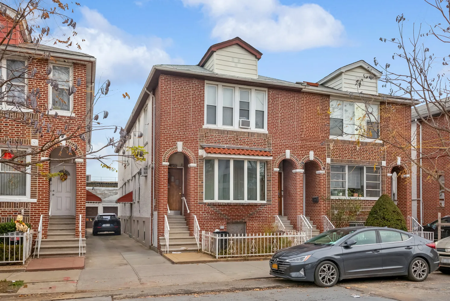 a car parked in front of a house